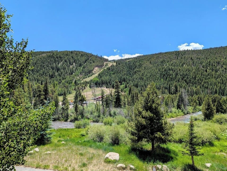 Balcony view of Snake River and Keystone ski hill #summer