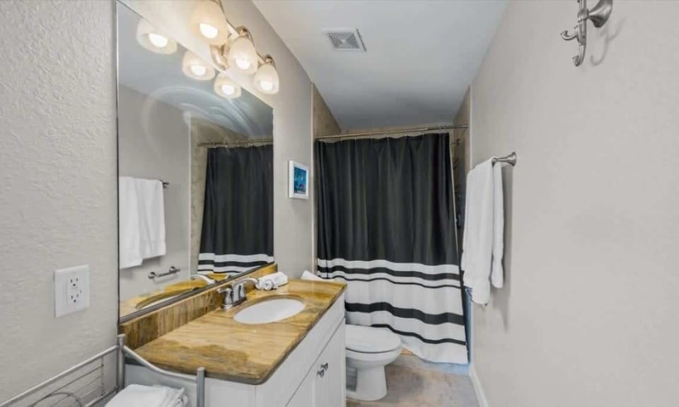Upstairs bathroom with shower (no bathtub) 