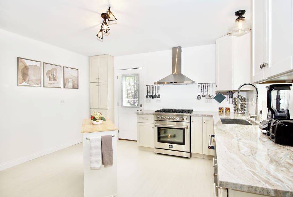 A spacious, well equipped chef's kitchen awaits you.