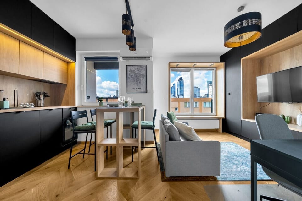 Comfortable Living Room with Sofa Bed and Smart TV | Book Now with RENTUJEMY
