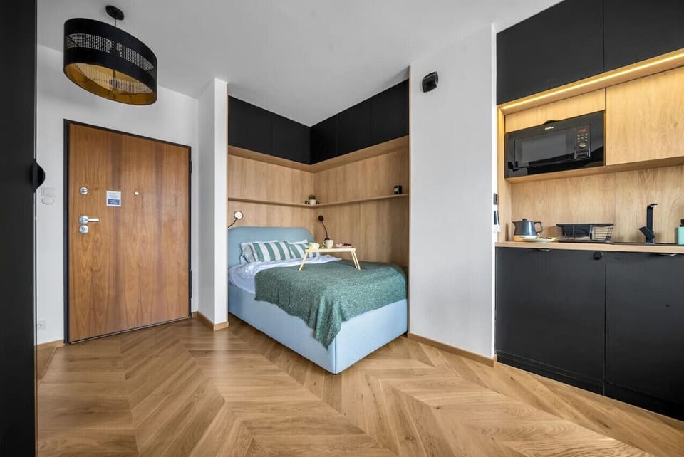Comfortable Living Room with Sofa Bed and Smart TV | Book Now with RENTUJEMY