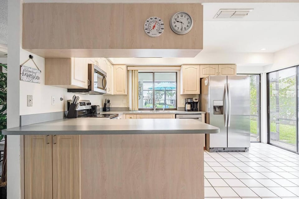 Enjoy cooking with a view of the pool!