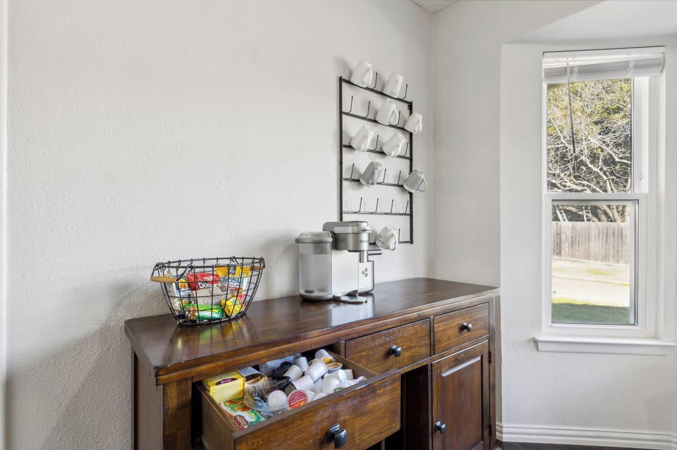 Coffee bar with selection of coffees and teas. Cream and sugars provided.