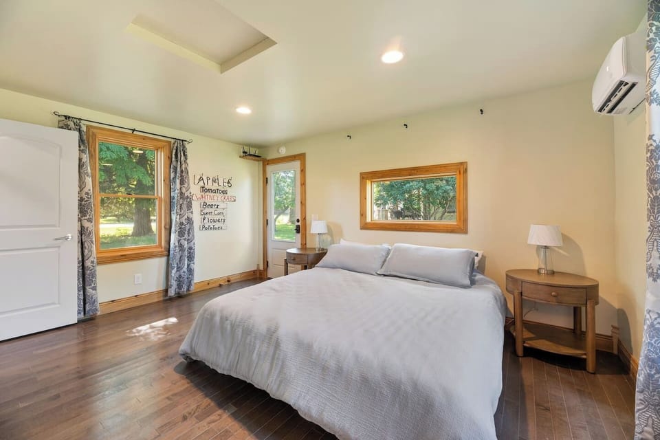 Bedroom - curtains have been added above the bed