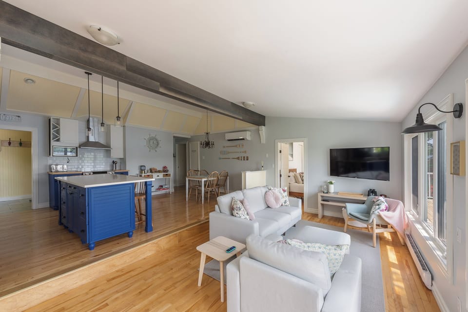 Open Concept Living Area with Fully Equipped Kitchen