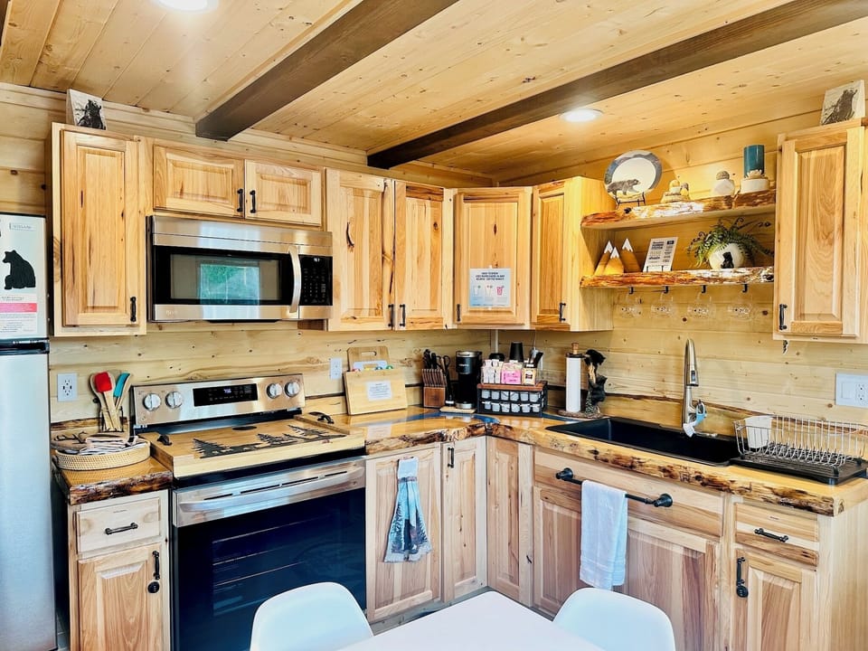Full Kitchen with Essential Utensils, Cookware, and Coffee Bar
