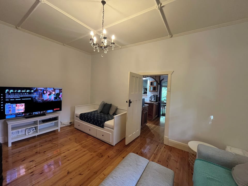 Lounge Area. Spacious. QLED 65in (Netflix, Play Station 5 Pro). Day Bed also.