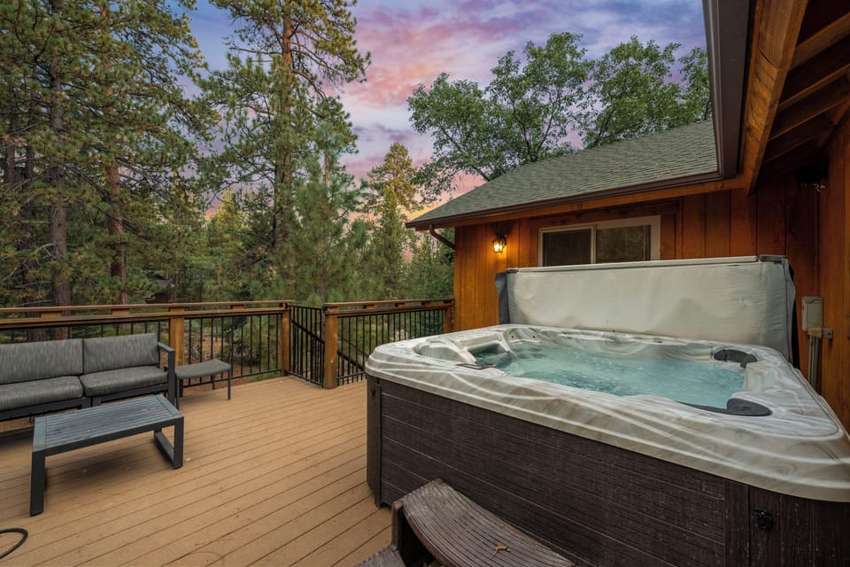 Back Deck - Back Deck with Treetop views and walking trail into the village. Private hot tub, fire pit, and comfy seating