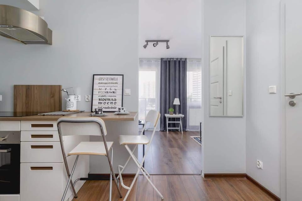 Kitchenette with coffee machine.