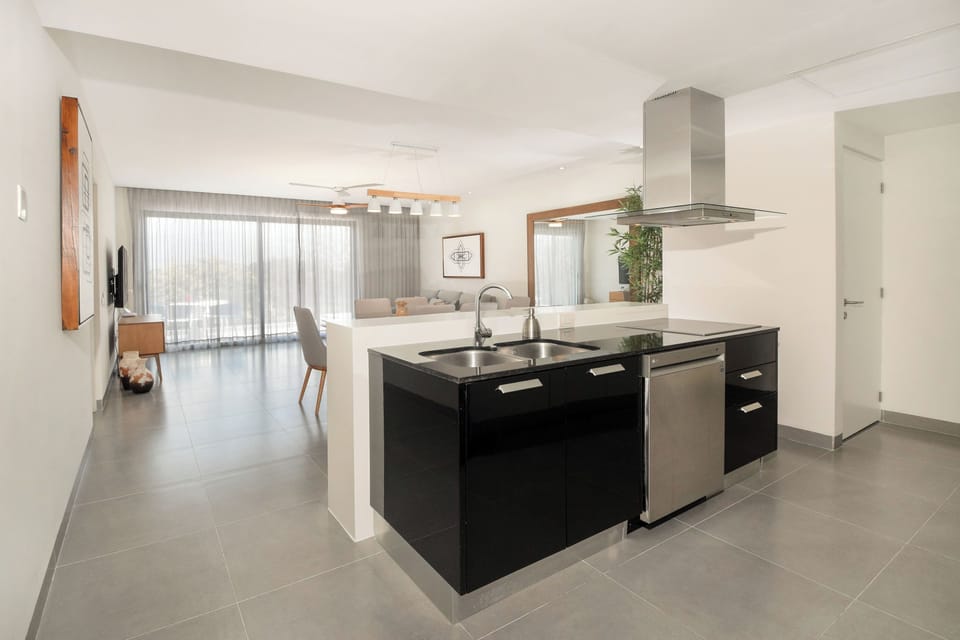 Create your favorite meals in our fully functional kitchen, featuring modern amenities.