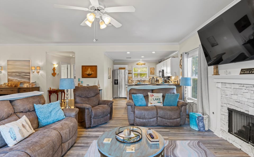 65" TV is provided streaming Spectrum, You Tube TV, Netflix, Prime, and Pandora