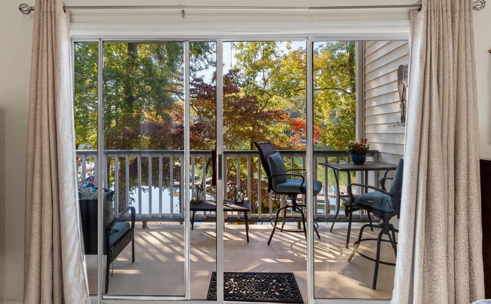 Living Area patio offers spectacular lake views with seating for 6 people 