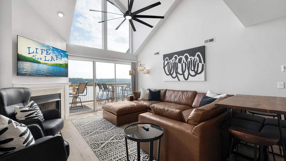 Beautiful Open living area with oversized leather sectional. 