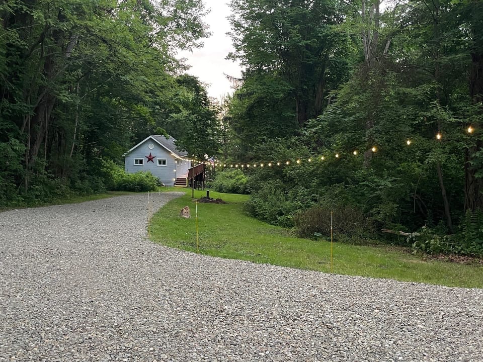 Plenty of parking at the top, leads to narrow driveway to the Oasis.