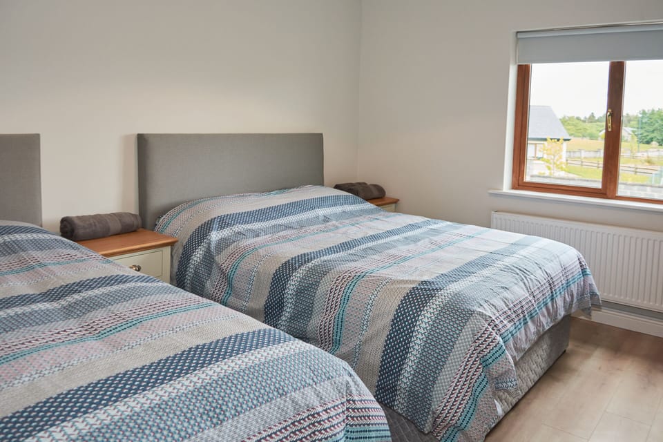 bedroom 1, 1 double bed, 1 single bed. triple room