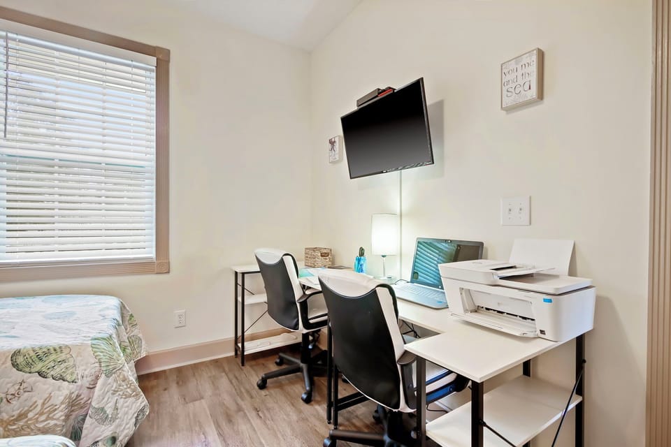 There is also a double desk with two chairs for "gaming" or working remotely.