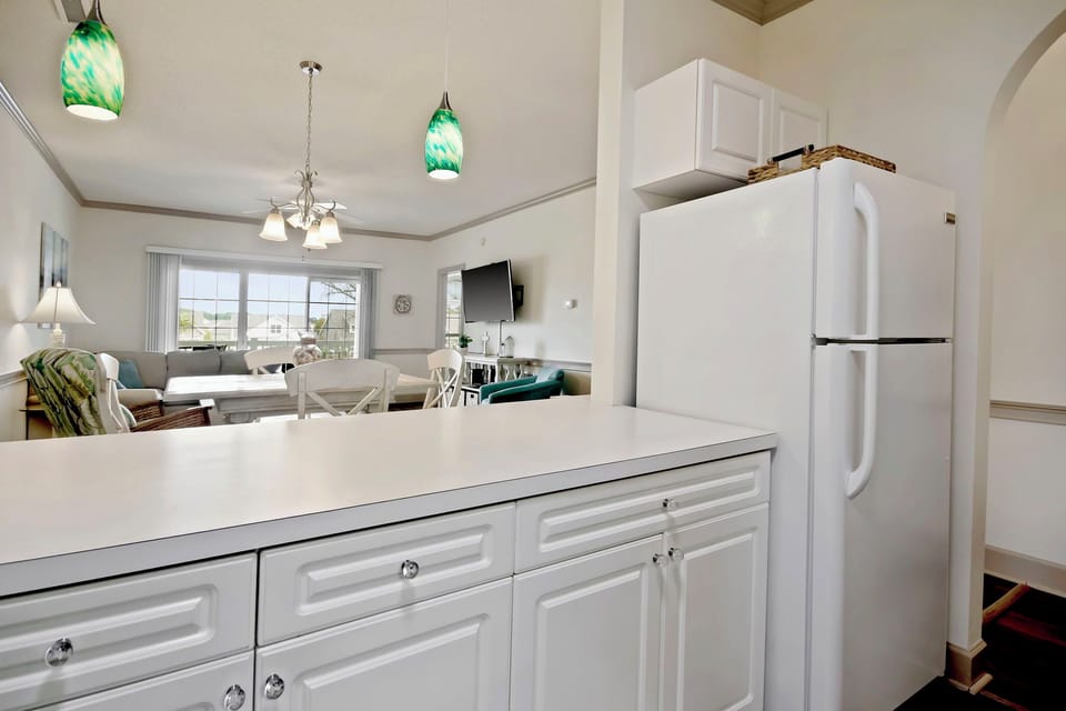 The kitchen is well stocked. There are dishes, utensils, pots, pans & bakeware.