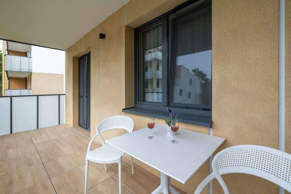 Balcony with dining area.
