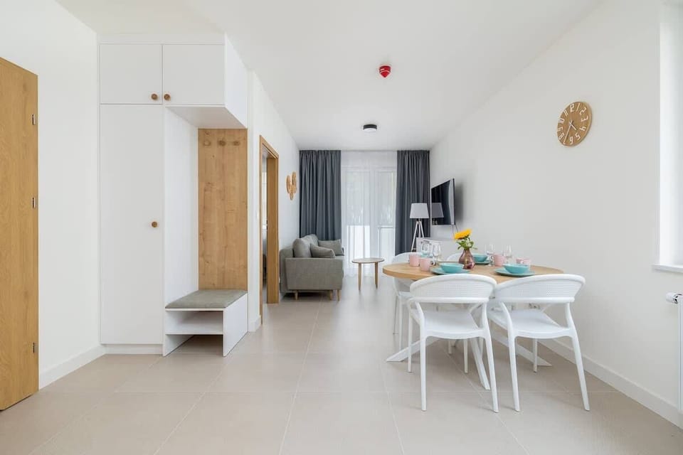 Living room with dining table and chairs.