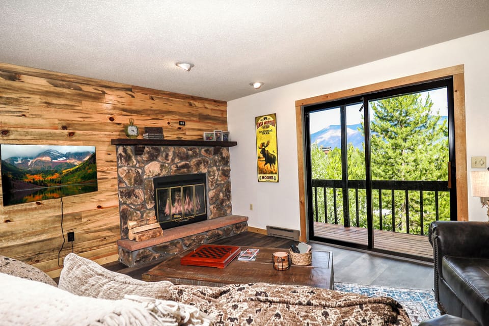 Living area w/ woodburning fireplace