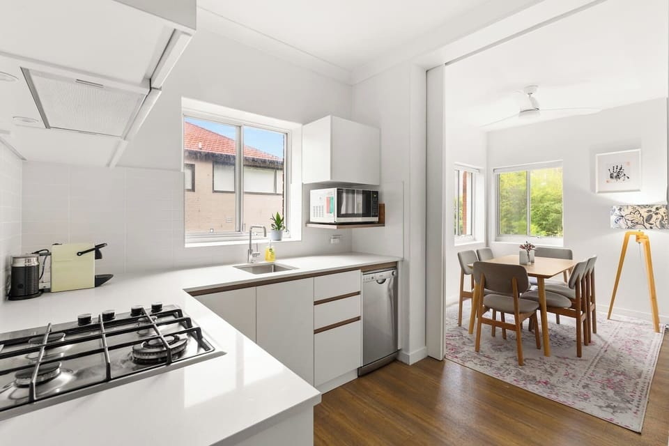 Flip some pancakes and brew fresh Nespresso coffee in this light-filled modern kitchen. 
