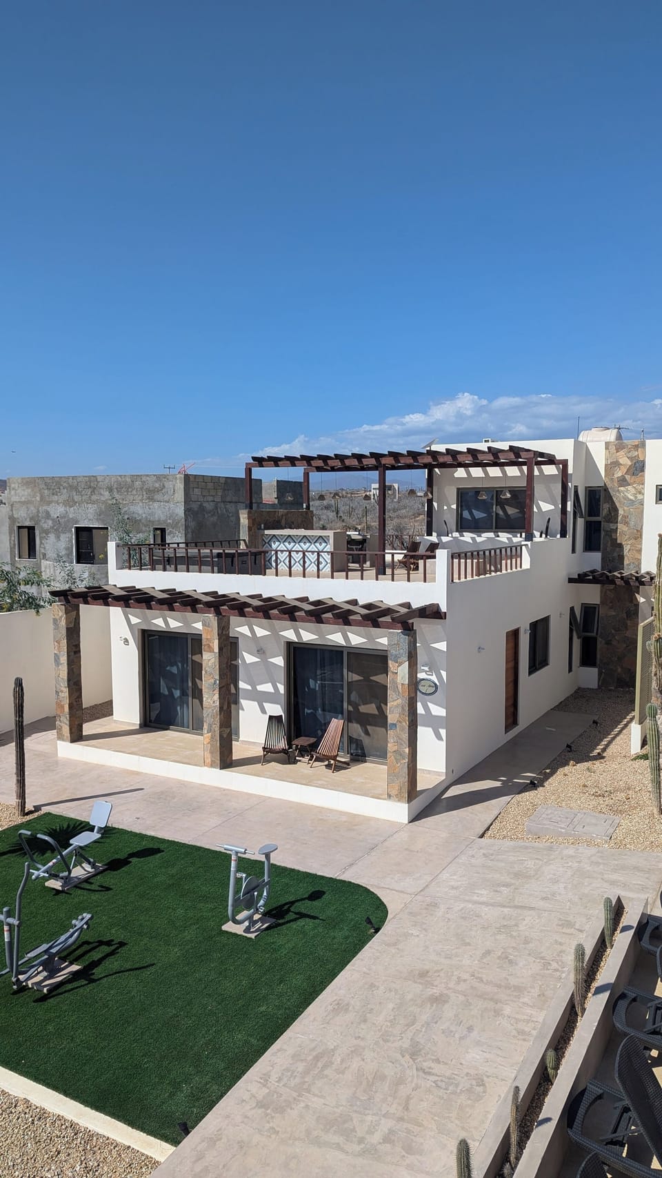 Penthouse is on the second level and has its own exterior staircase for access.