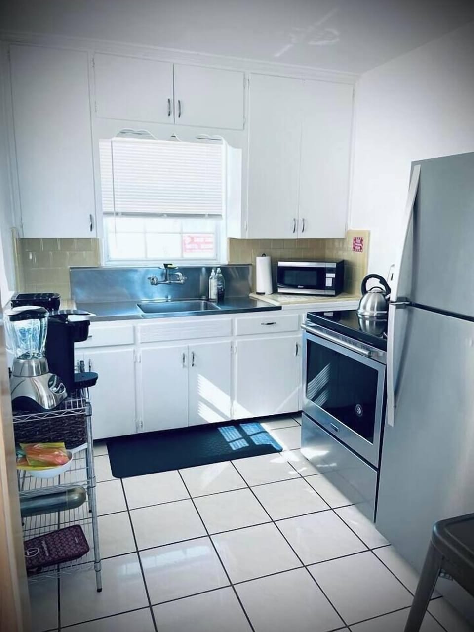 Kitchen fully equipped with anything you need to make a basic meal. If there is anything we don't have, we are happy to entertain adding it to what we provide in this kitchen already. 