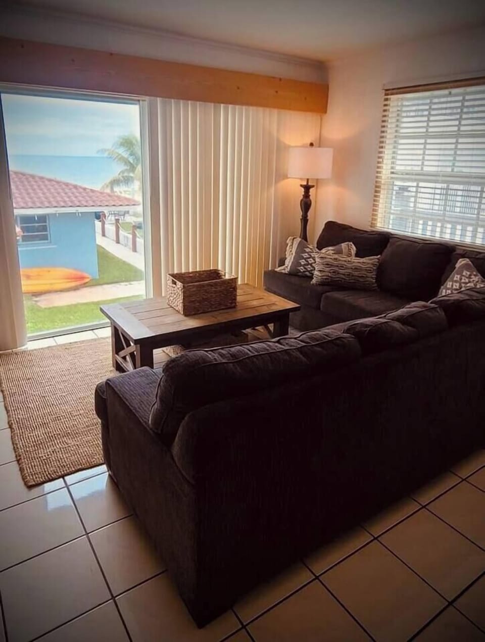 Living room with a view. Enjoy your coffee from the couch and the sunrise or take it down to the beach and enjoy the sunrise there.