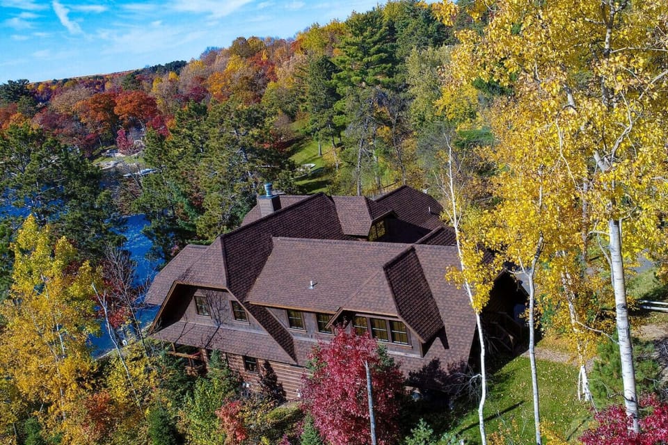 Aerial view of the Lodge House on Roy Lake