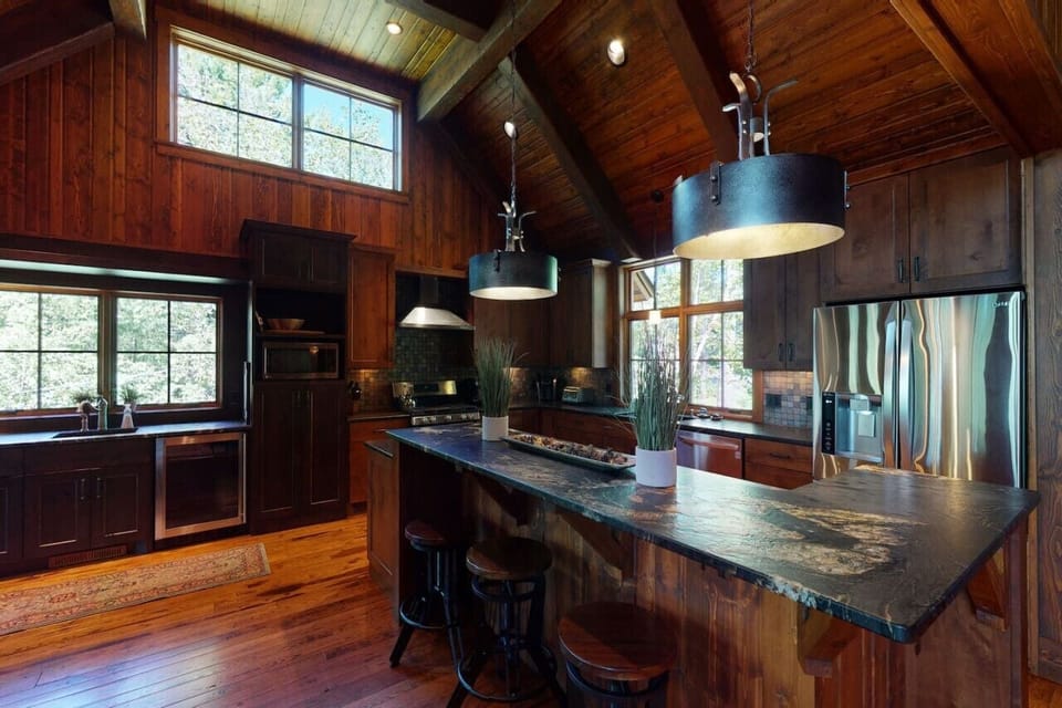 Full kitchen, including gas range, electric oven and center island.