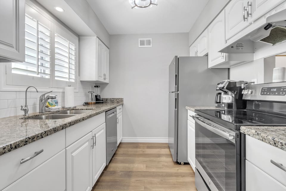 Fully Equipped Kitchen with Stainless Steel Appliances