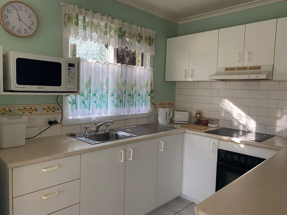 Fully equipped kitchen with the basics you need for your stay. 