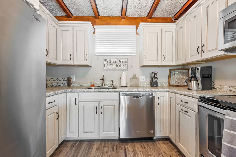 Stylish kitchen with ample storage, modern amenities, and a welcoming atmosphere for cooking and dining.