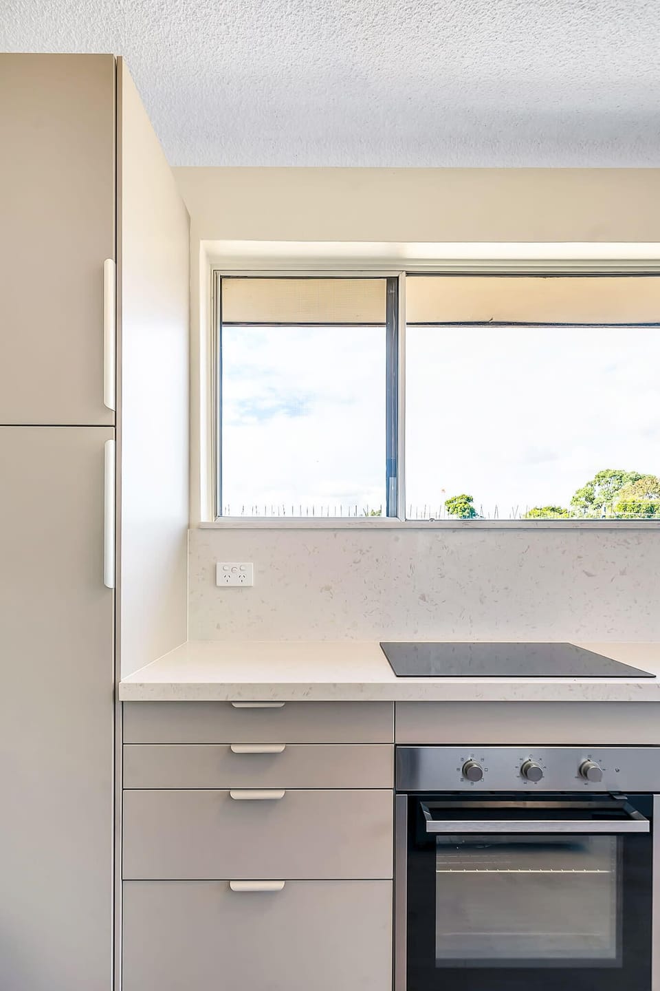 Enjoy a fully-equipped kitchen with washer, dryer, oven and dishwasher for seamless living.