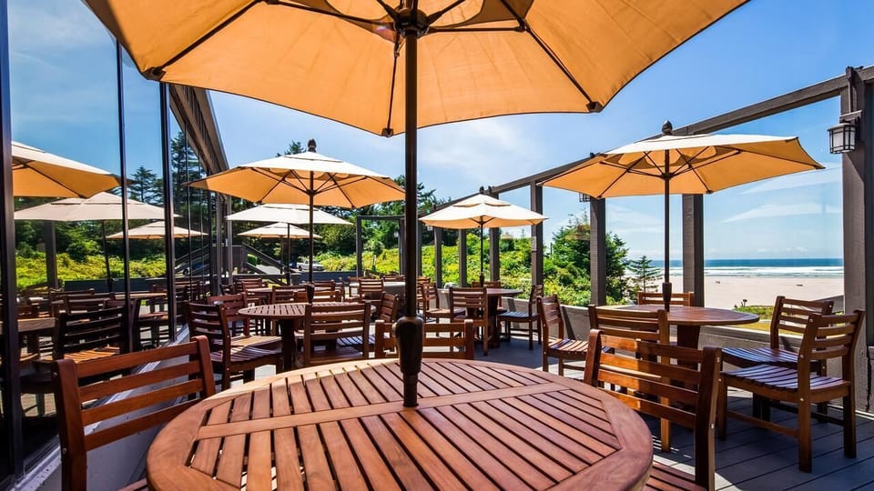 Sip cocktails outdoors while soaking up sweeping ocean views.
