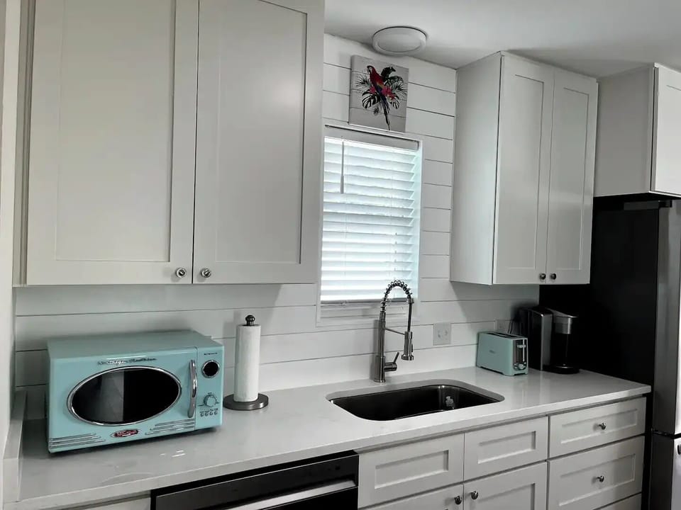 Microwave, Toaster, Keurig Coffee Maker. 