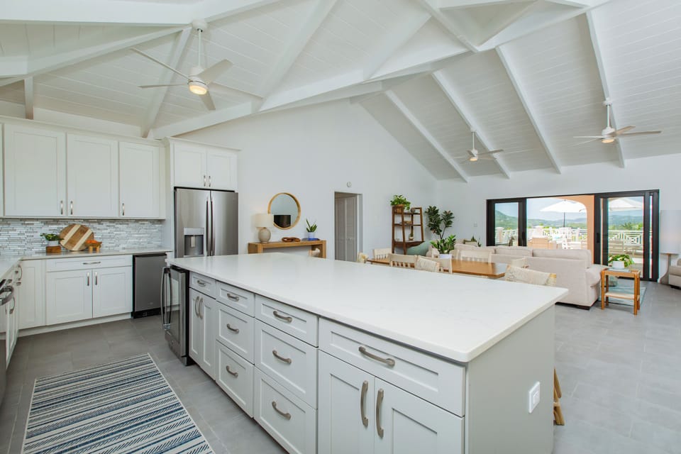 Upstairs kitchen with view of the pool.