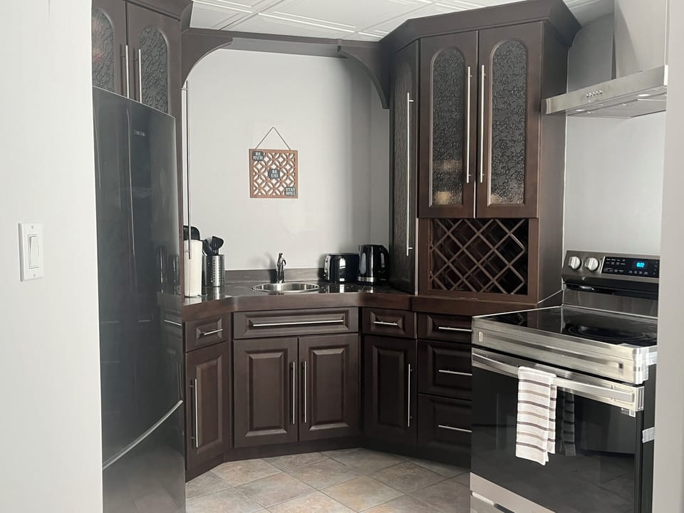 Open Kitchen equipped with all essential appliances