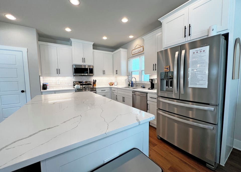 Island for entertaining & French- Door refrigerator with water and ice maker. 