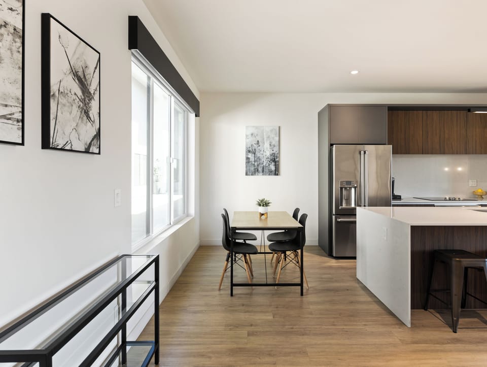 1st Floor: Fully equipped modern kitchen completely stocked with all culinary essentials and includes high-end Cafe stainless steel appliances. Dining table offers a space for four.