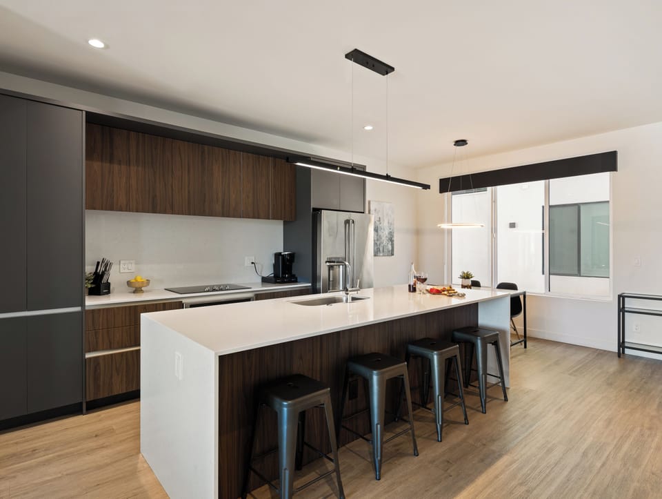 1st Floor: Fully equipped modern kitchen completely stocked with all culinary essentials and includes high-end Cafe stainless steel appliances.