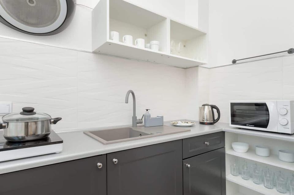 Kitchen with microwave.