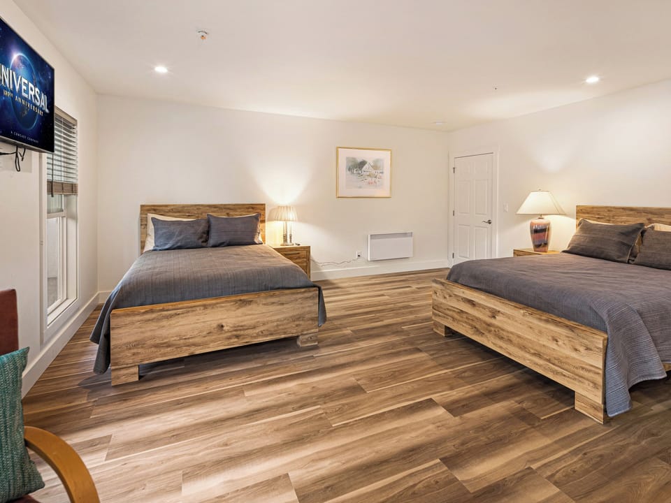 The China Pearl Suite has two queen beds, a private full bathroom and Smart TV. 