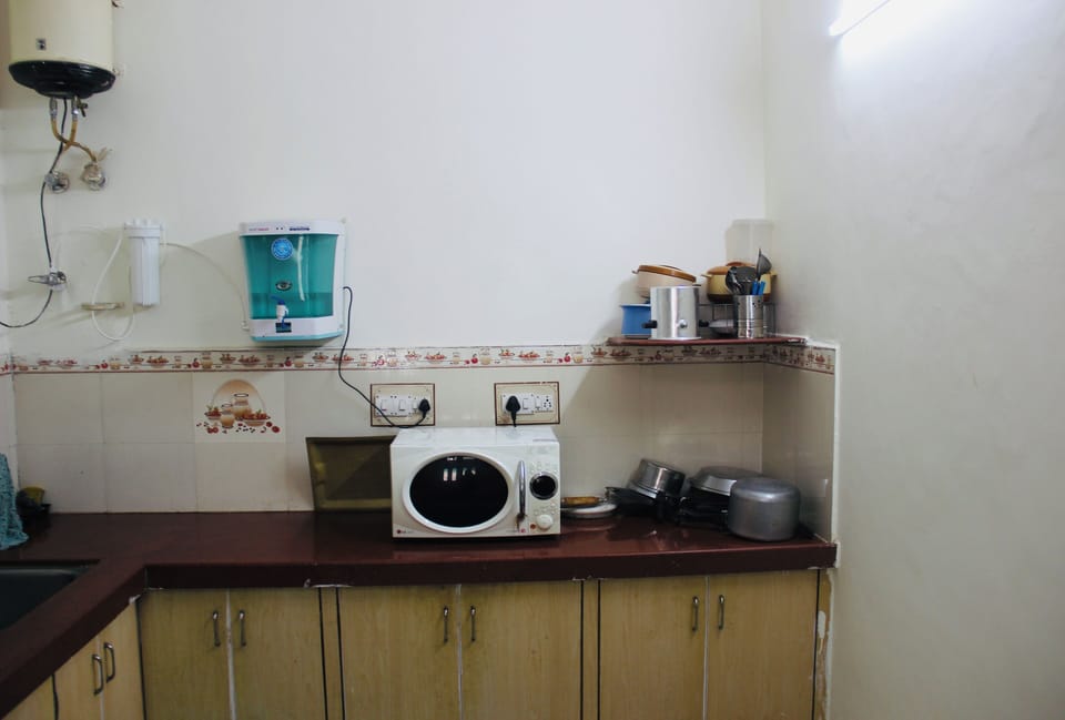 Water Purifier + Microwave provided with Most Kitchenette for Guest's Use