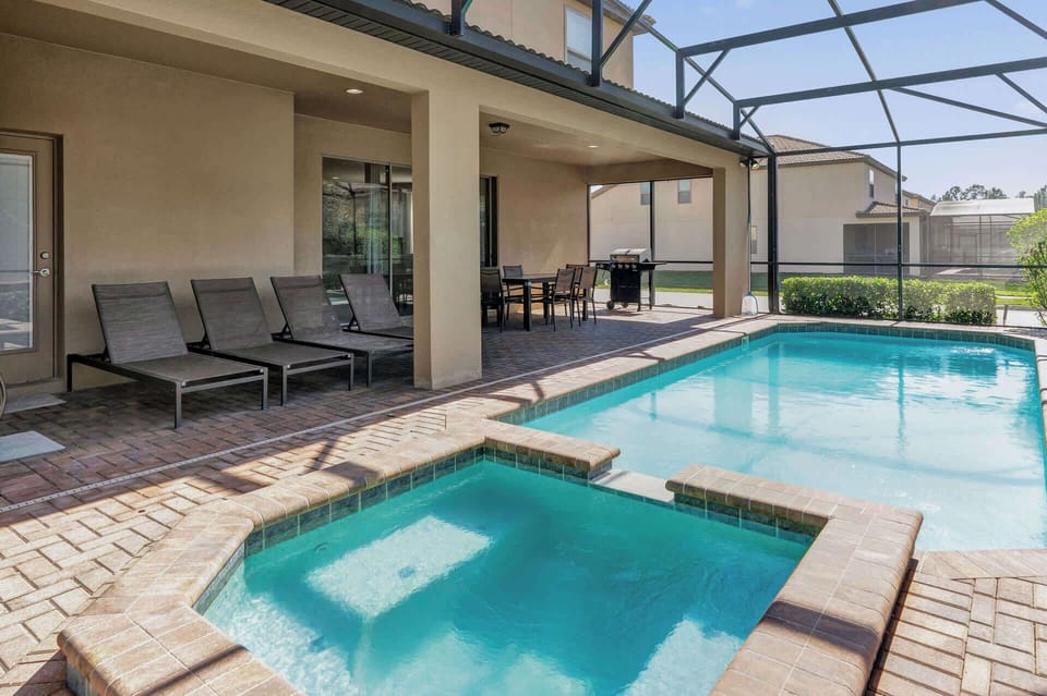 Private Outdoor Pool Area with Jacuzzi, Sun Loungers and Covered Patio