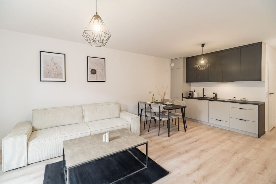 Comfortable Living Room with Sofa Bed and Smart TV | Book Now with RENTUJEMY
