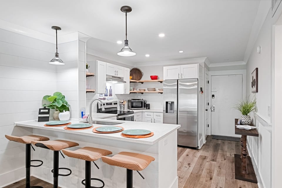 The kitchen has seating for 4 at the island. 