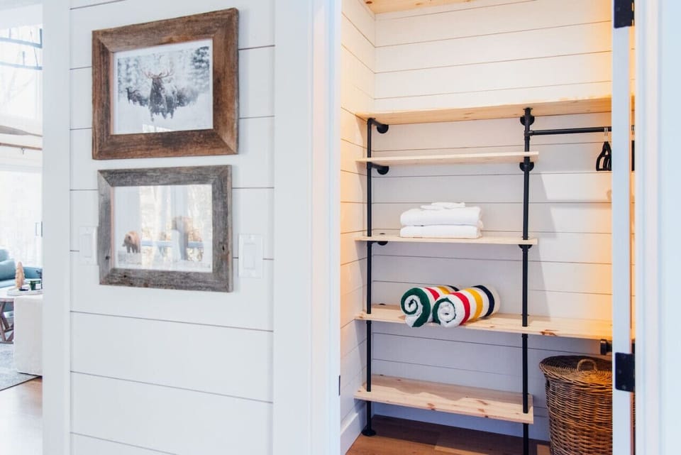 Walk in closet in the master bedroom with plenty of shelves and hangers for your clothing.