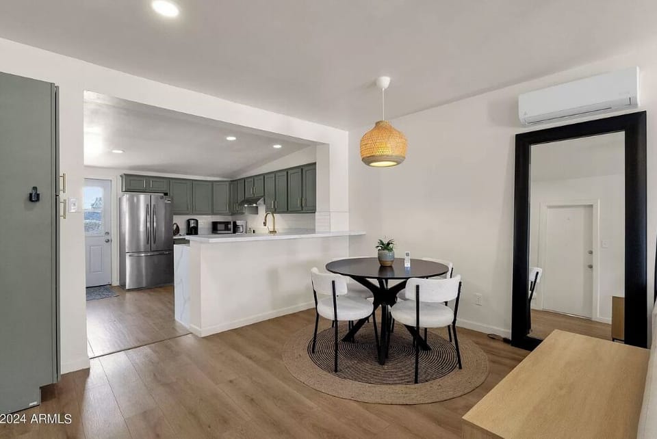 Dining room with seating for 4. All the dishes, glasses, and silverware included