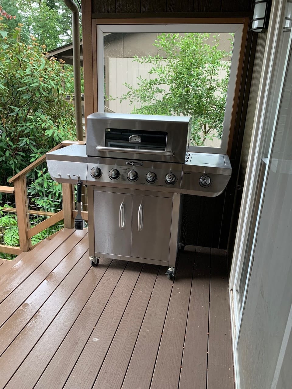 BBQ w/side burner, peekaboo window, tools and flat top grill stashed underneath